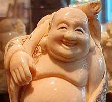 Buda with bag
