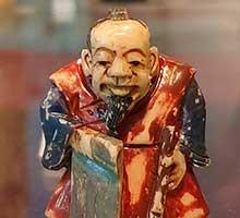 Hombre con pincel - netsuke